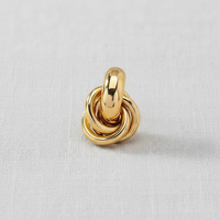 Gold Tone Geometric Twist Earrings